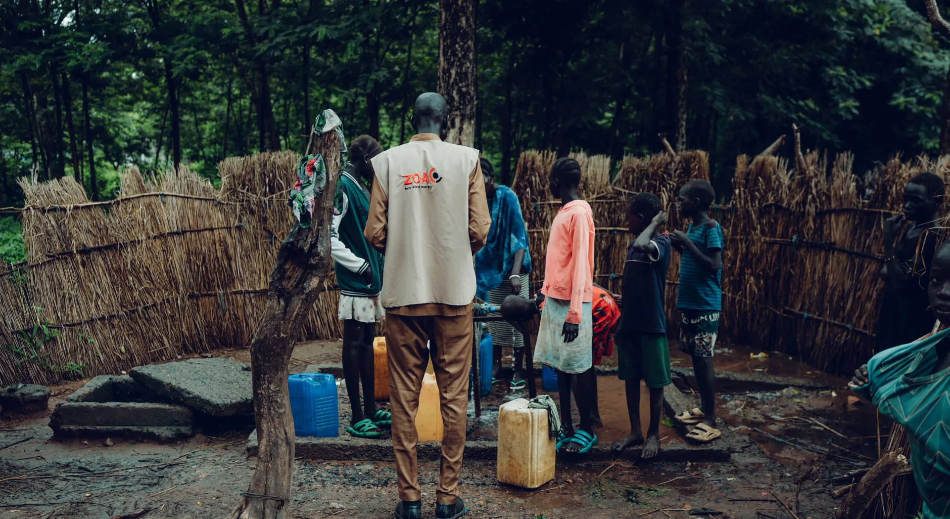 People at a waterpump in Ethiopia