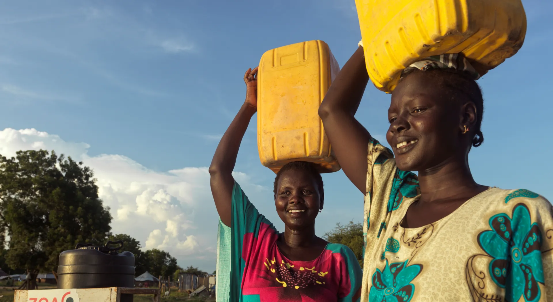 Women in South Sudan carrying water