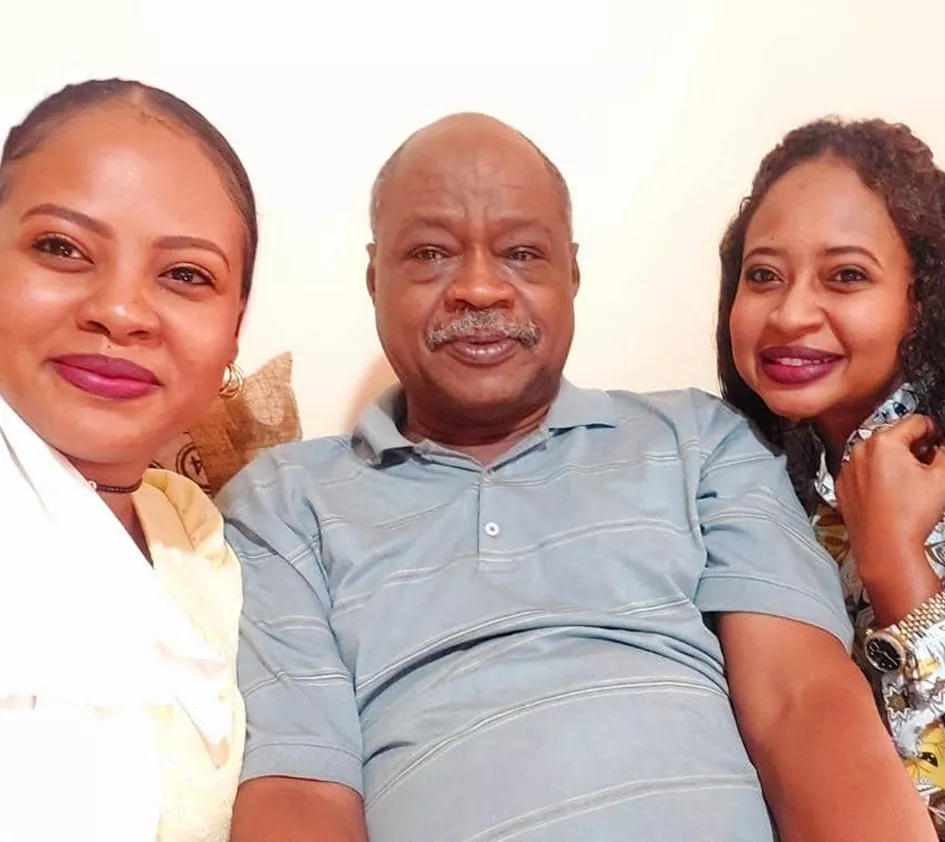 Sudan Isam with his daughters
