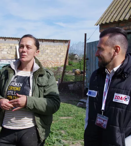 Halyina with a ZOA worker