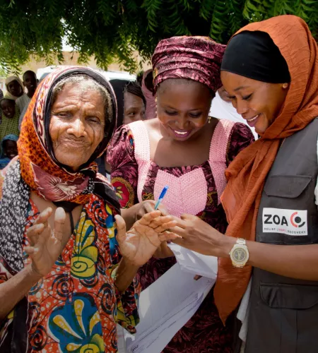 A women enlisting for relief aid