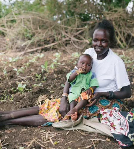 A woman with her child in Uganda