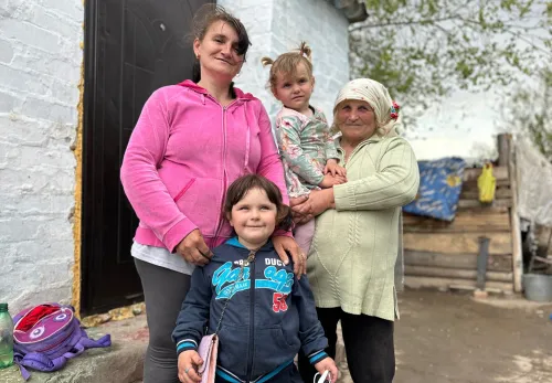 Olha with her daughter-in-law Olia and granddaughters Tamila and Olia